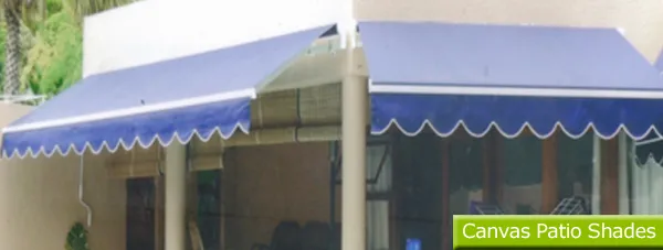 Canvas awnings shading a patio doorway