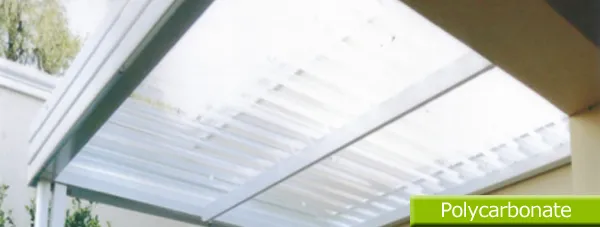 Translucent polycarbonate roof sheets over a patio